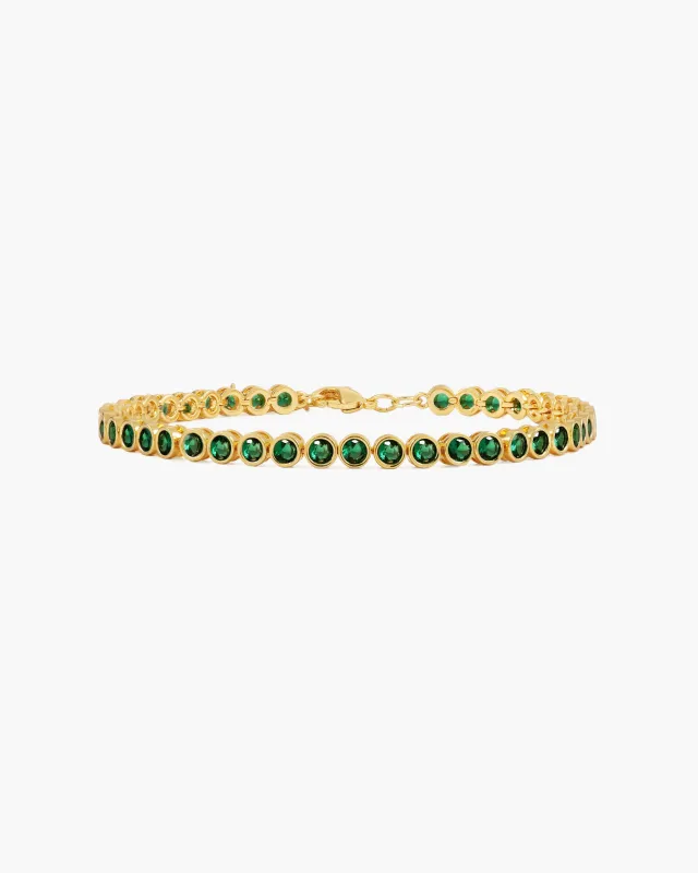 Emerald Tennis Bracelet in Gold sold by en route
