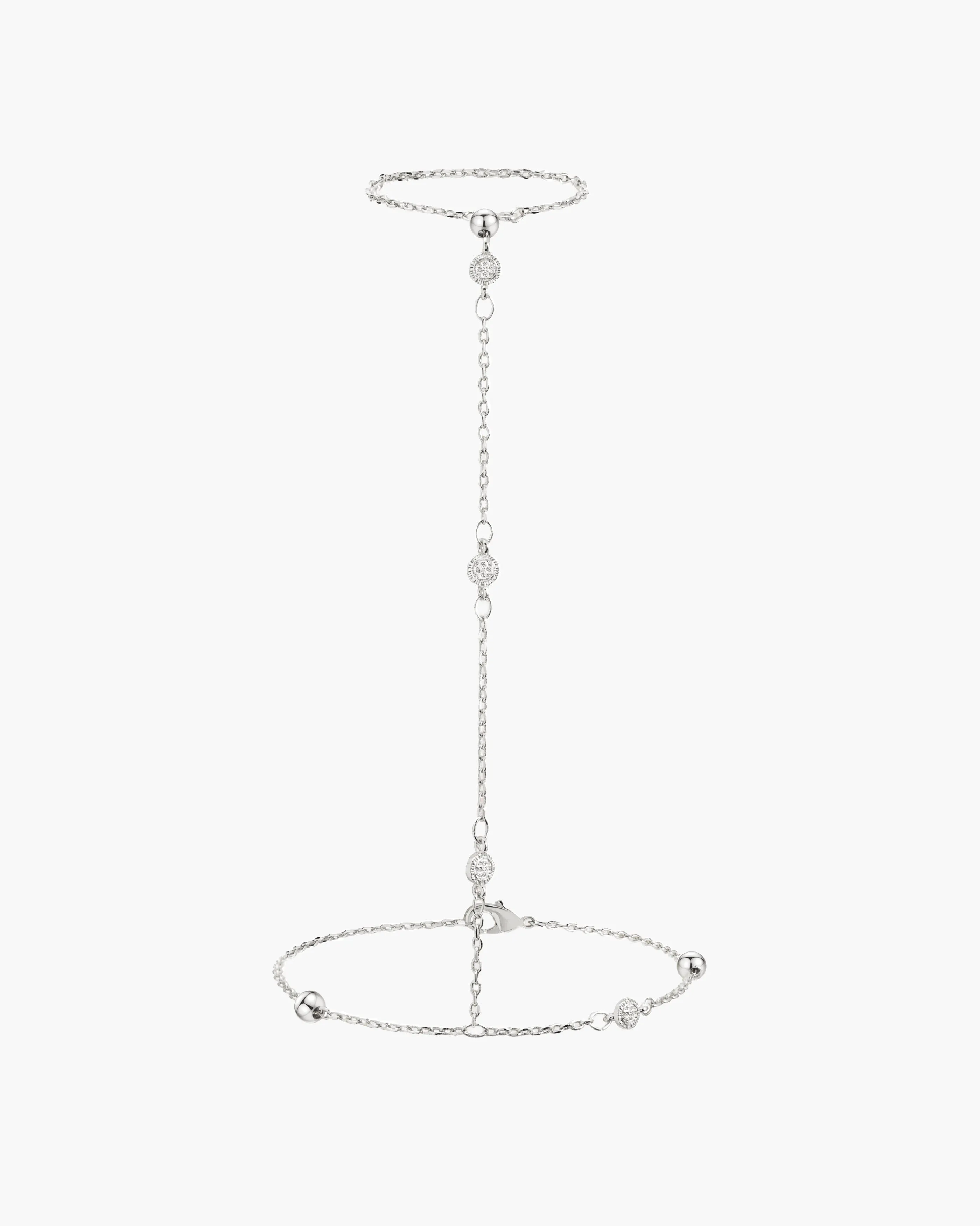 Hojas Coin Hand Chain Bracelet in Silver sold by en route