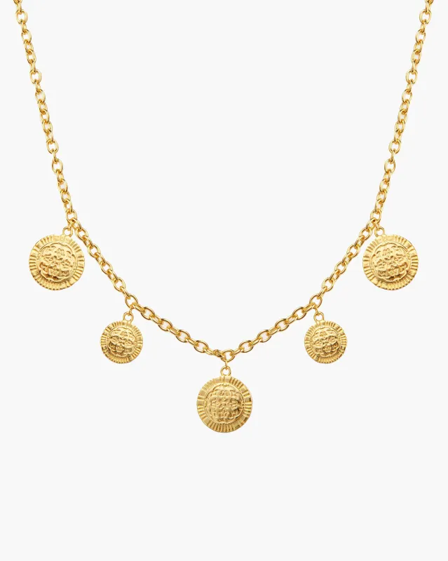 Golden Hojas Necklace sold by En Route Jewelry