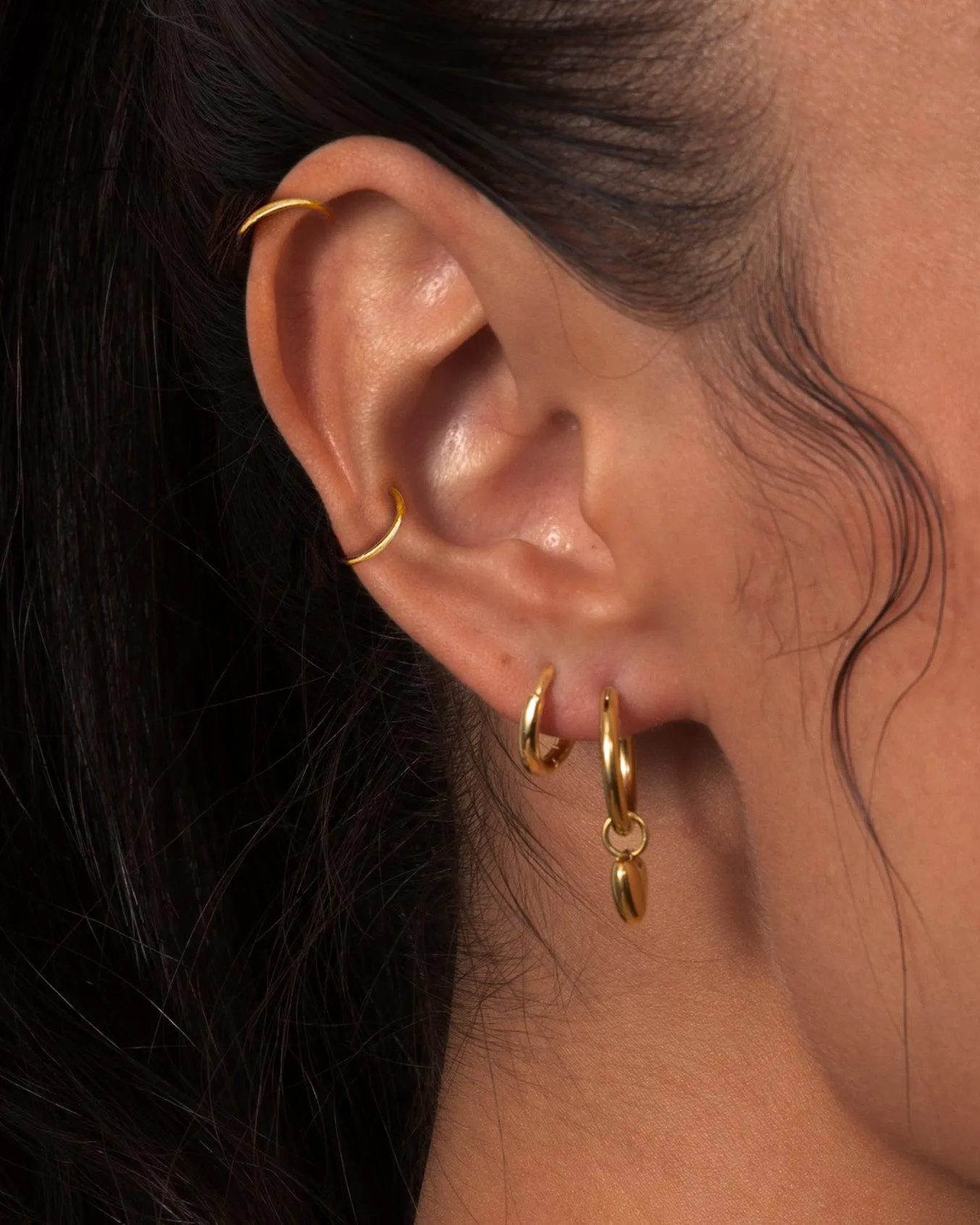 Single Mini Hoop Helix Earring in Gold sold by En Route Jewelry product image thumbnail 2