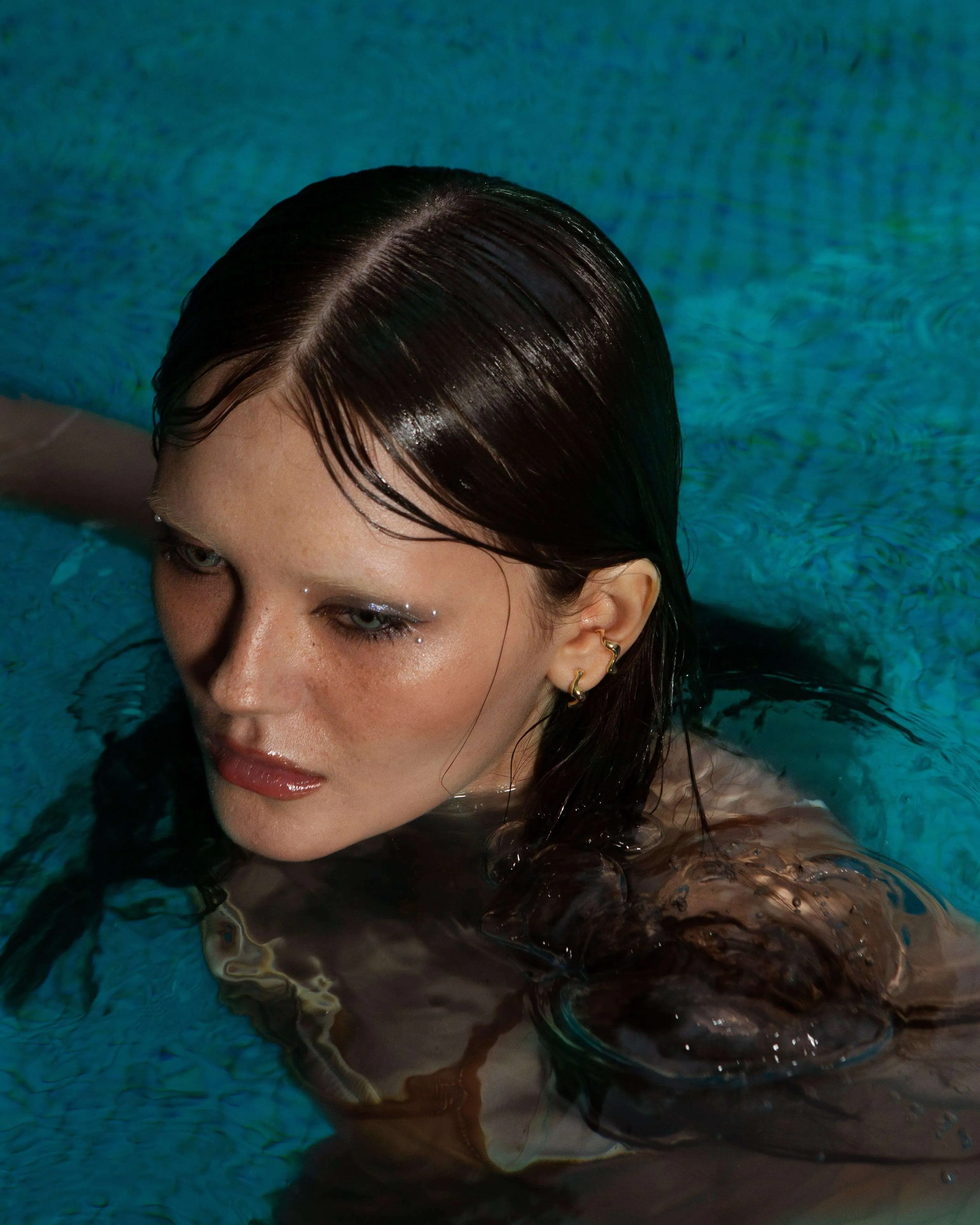 Gold Wave Hoop Earrings sold by En Route Jewelry product image thumbnail 5