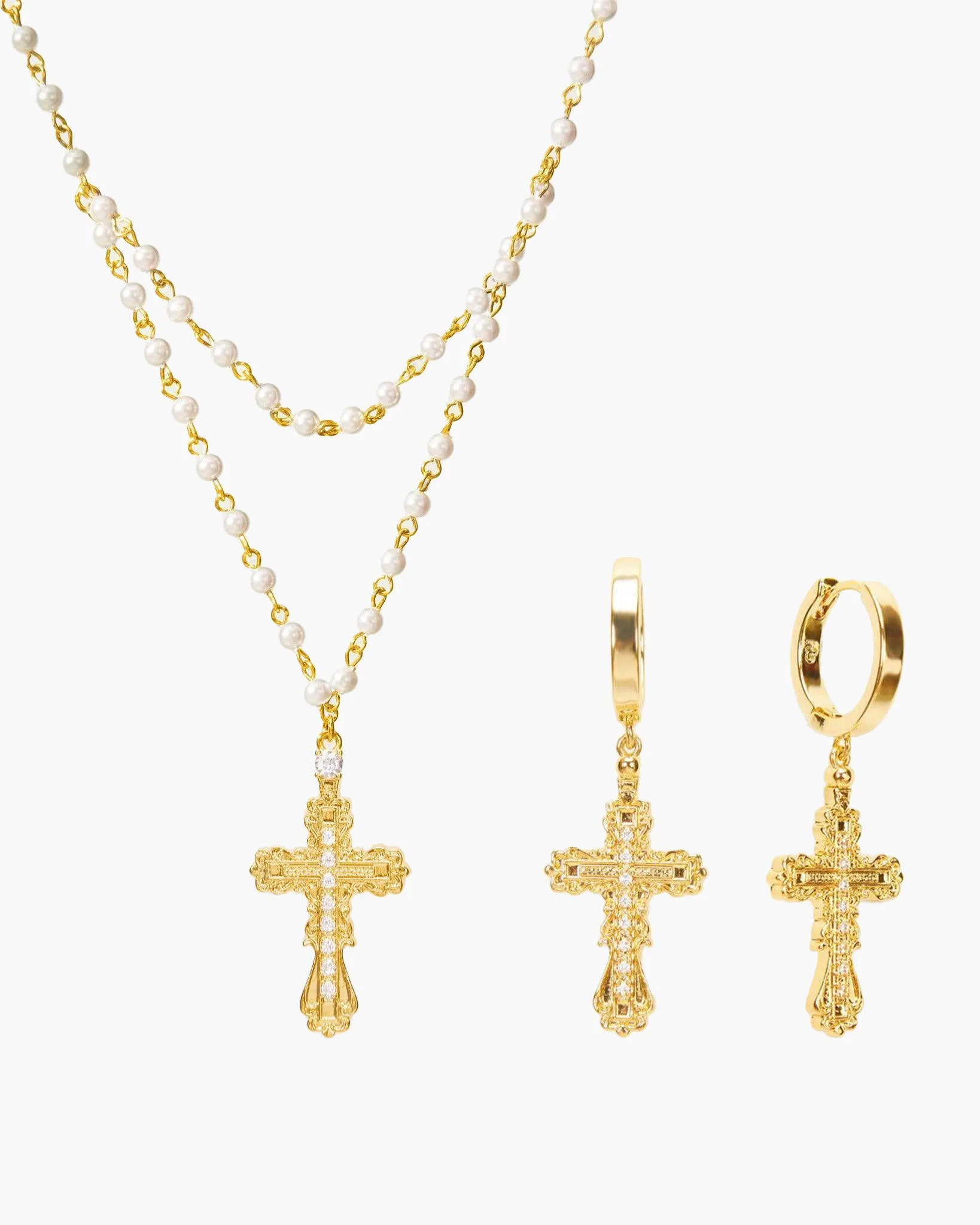 Everette Cross Set in Gold sold by en route