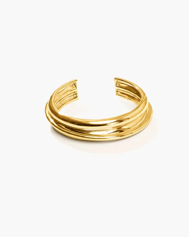 Bangles on Bangles in Gold made by En Route Jewelry