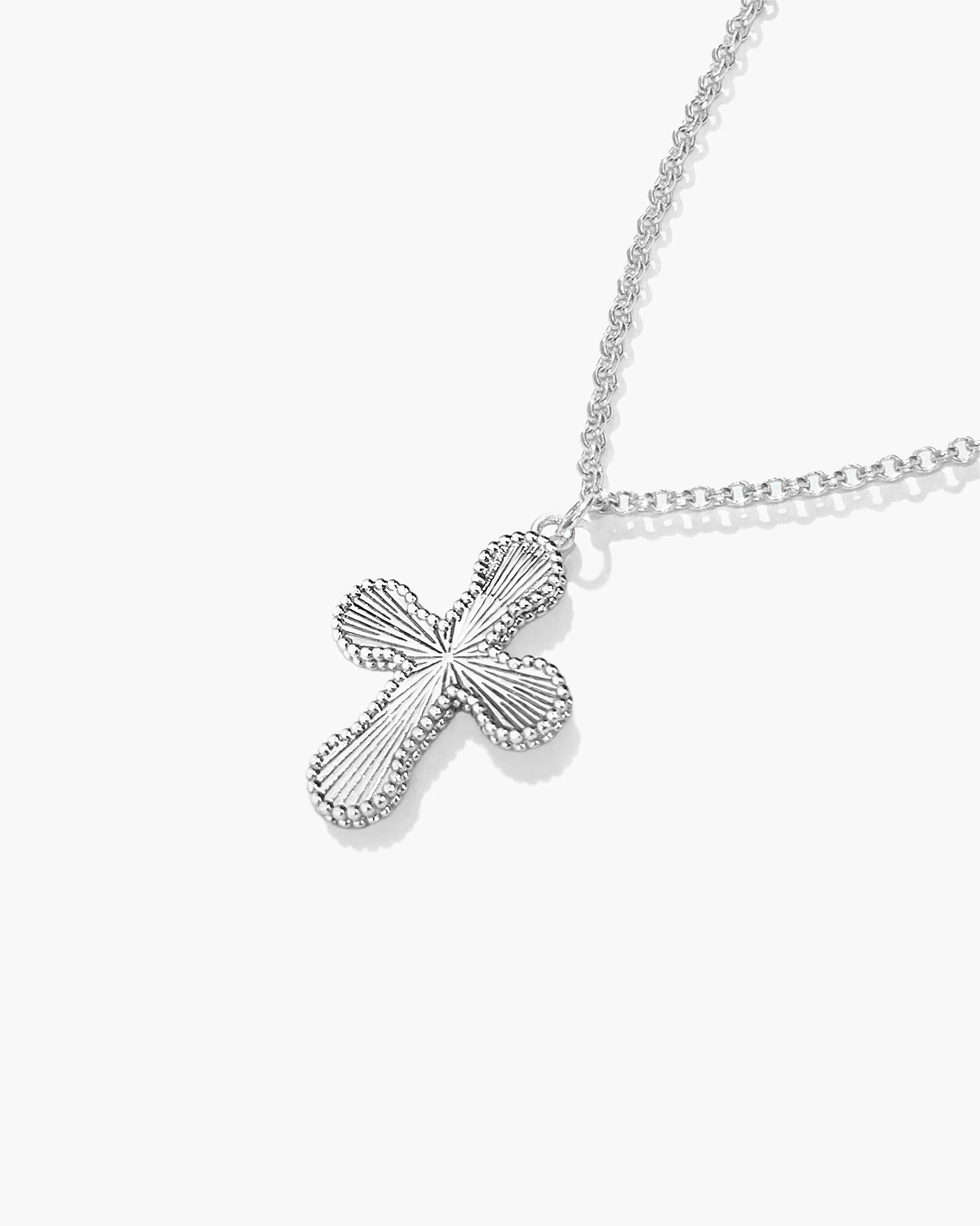 Mini Cross Pendant Necklace in Silver sold by en route product image thumbnail 3