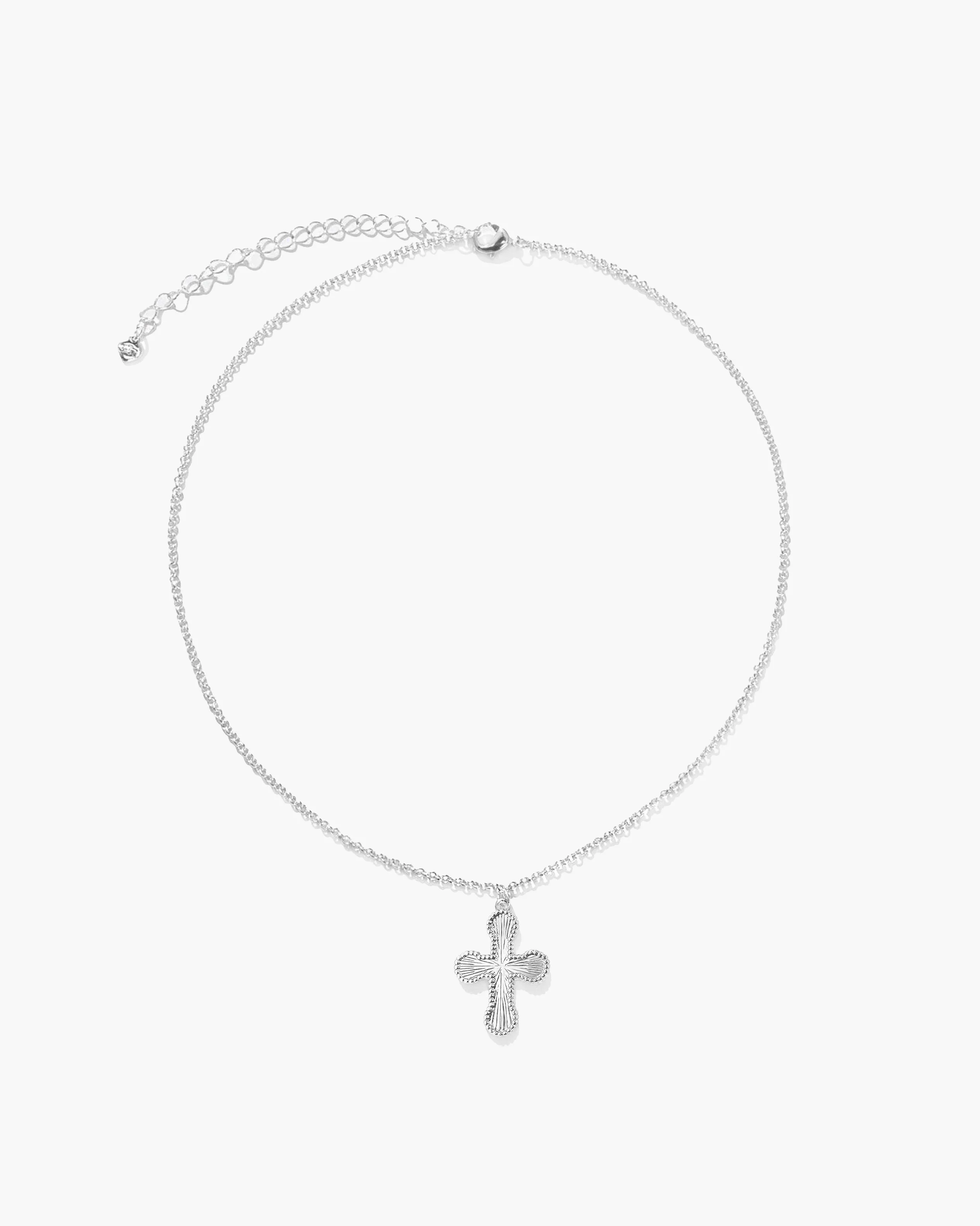 Mini Cross Pendant Necklace in Silver sold by en route product image thumbnail 4