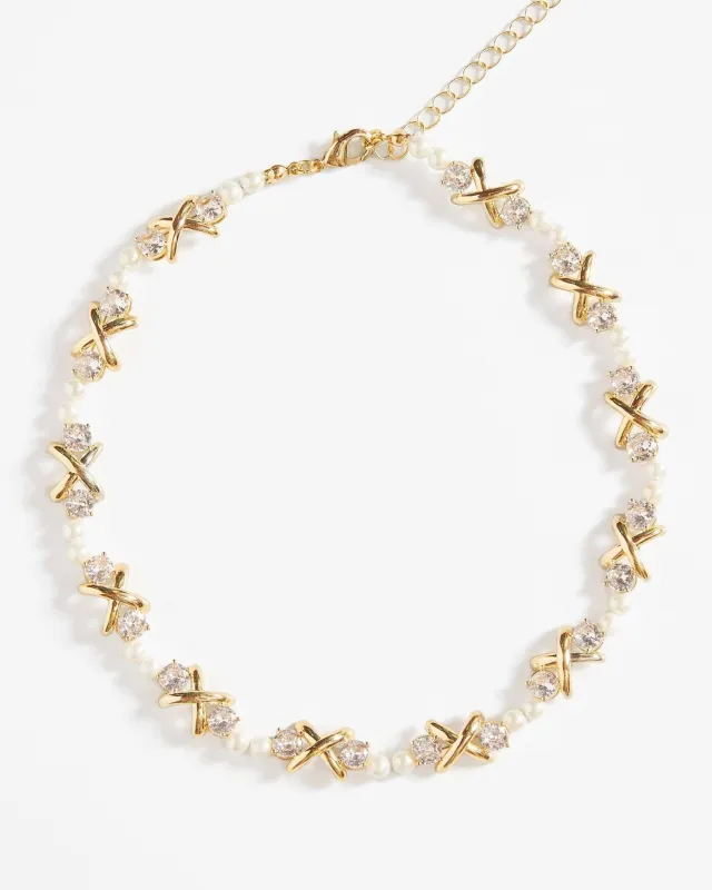 XOXO Necklace sold by En Route Jewelry