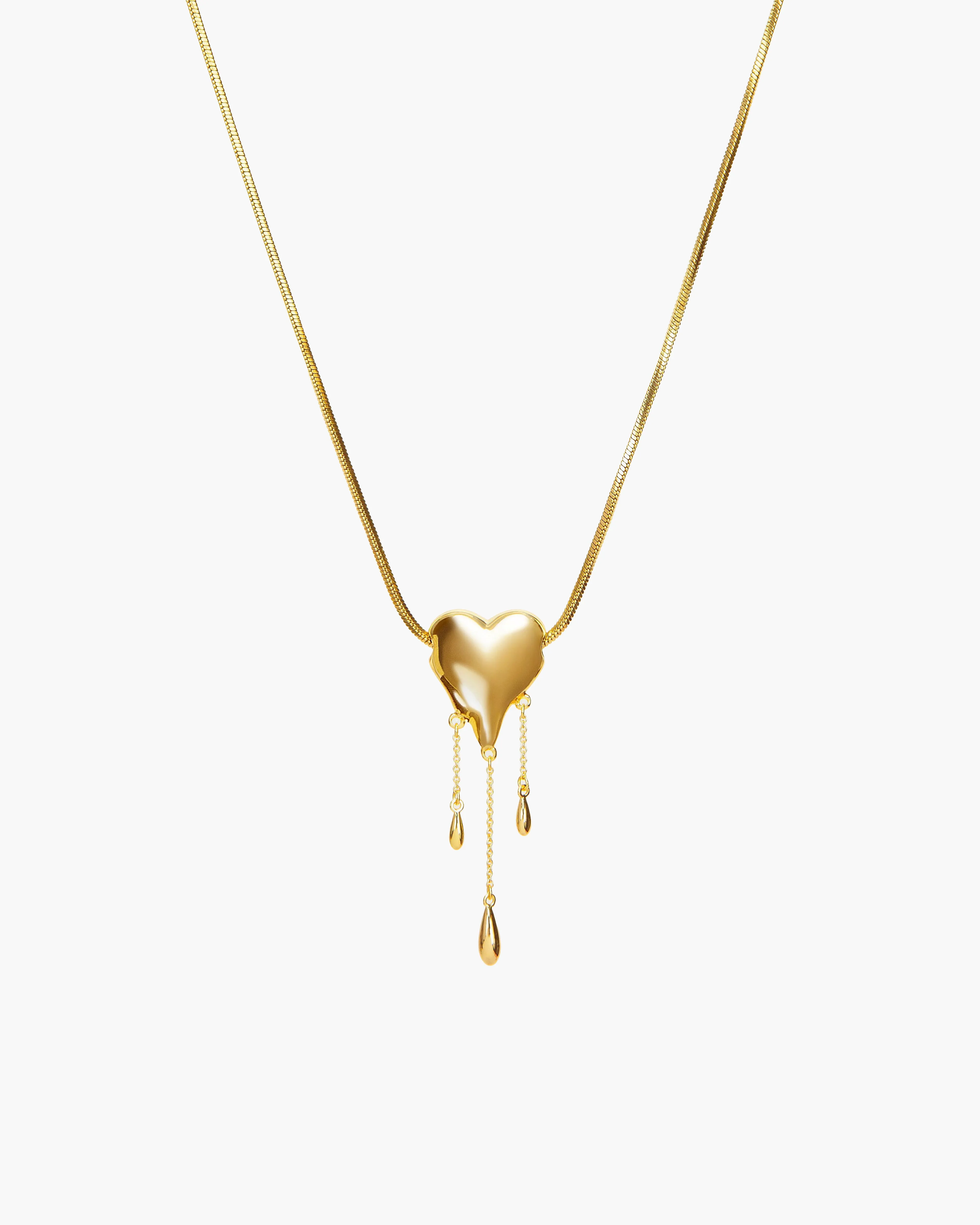 Venom’s Golden Drip Heart Necklace sold by En Route Jewelry