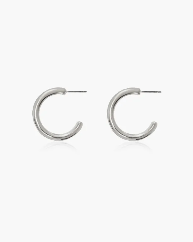 The Simple Hoop Earrings in Silver sold by En Route Jewelry