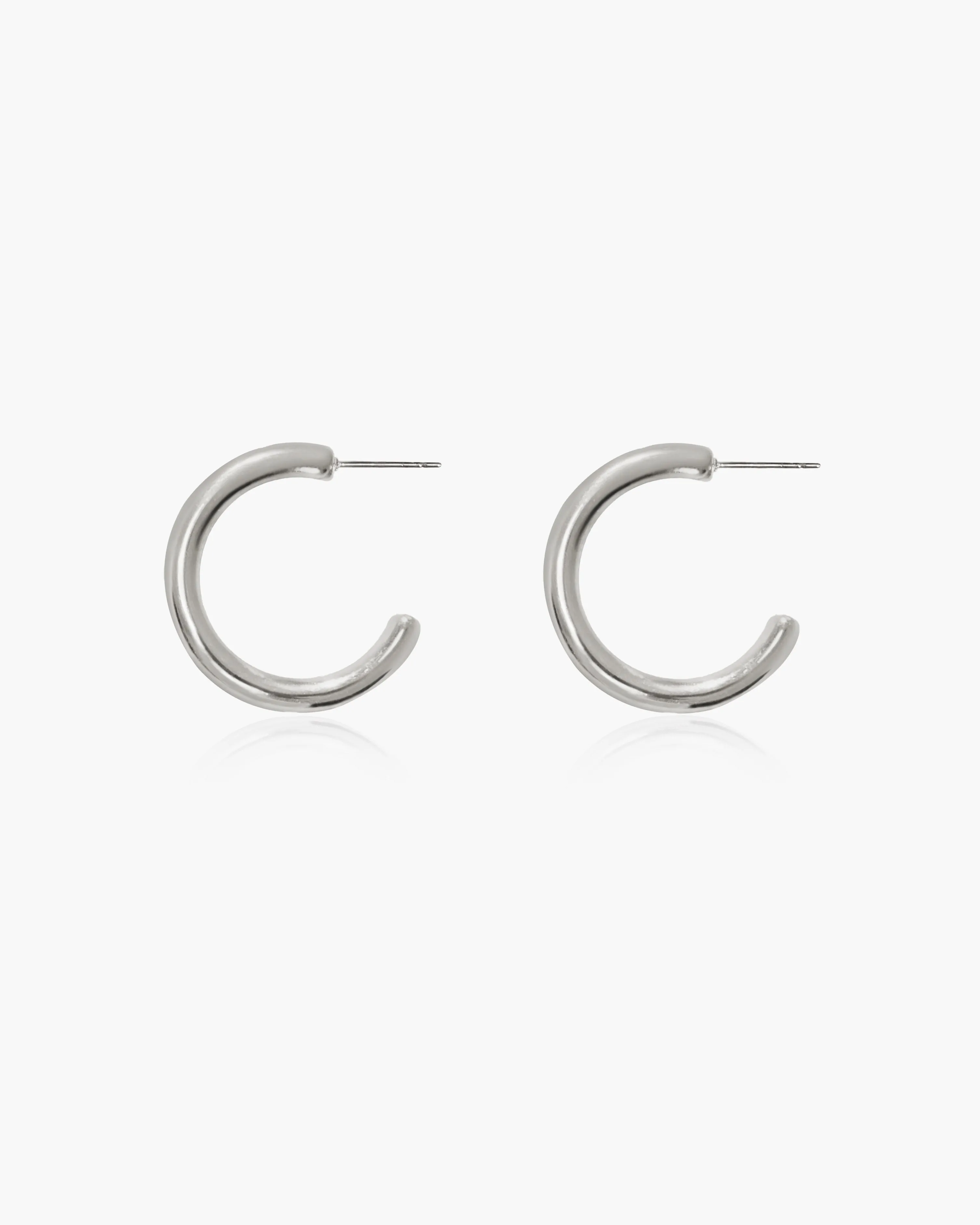 The Simple Hoop Earrings in Silver sold by En Route Jewelry