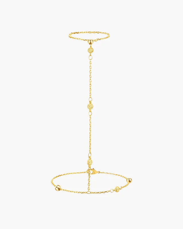Golden Hojas Coin Hand Chain Bracelet made by En Route Jewelry