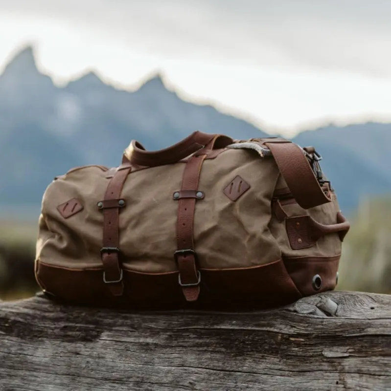 Dakota Waxed Canvas Duffle Bag/Backpack | Field Khaki w/ Chestnut Brown Leather sold by Buffalo Jackson