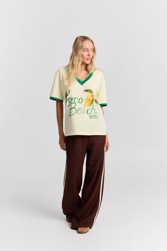 Coco Beach Hotel V-Neck Tee sold by Maku the Label