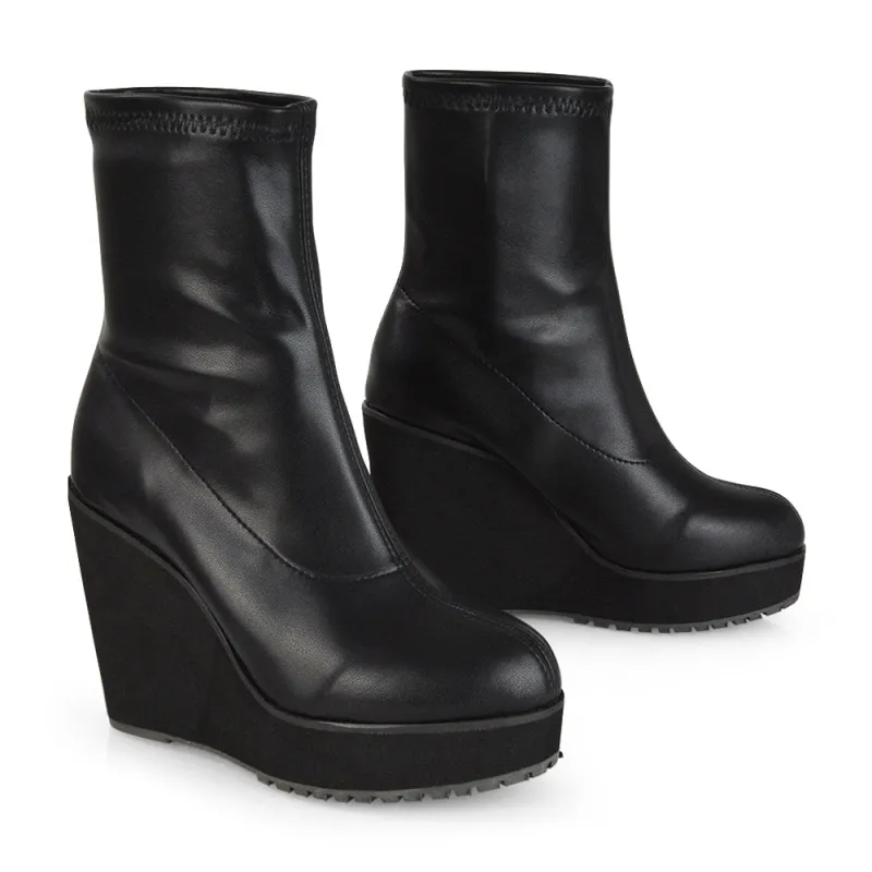 Athena Platform Wedge Heeled Sock Biker Ankle Boots in Black Synthetic Leather sold by XYlondon
