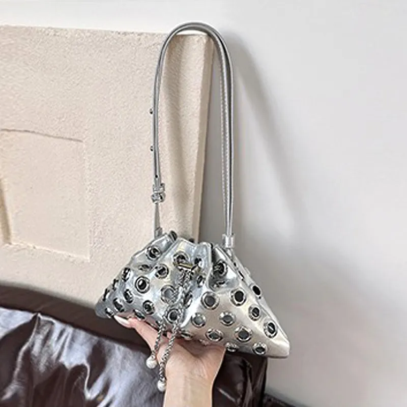Sally Metal Eyelet Shoulder Bag With Drawstring Fastening in Silver sold by XYlondon