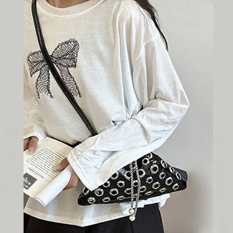 Sally Metal Eyelet Shoulder Bag With Drawstring Fastening in Black made by XYlondon