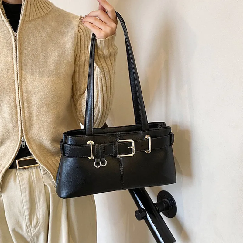 Blair Zip Up Faux Leather Shoulder Bag With Belt Detail Buckle in Black sold by XYlondon