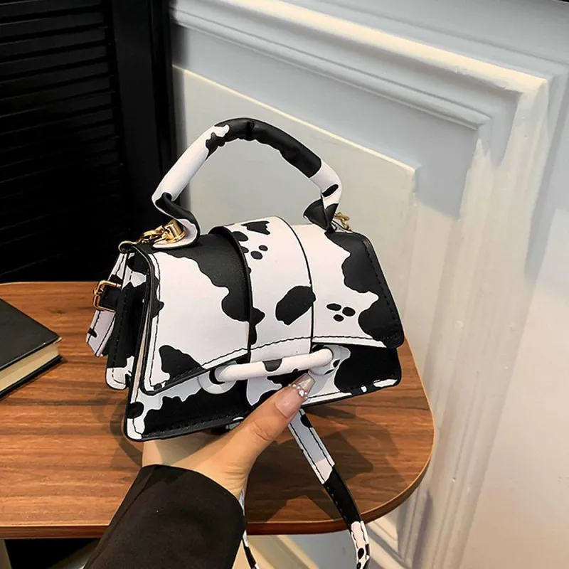 Kassie Trendy Small Top Handle Handbag For Women With Crossbody Strap in Cow Pattern sold by XYlondon