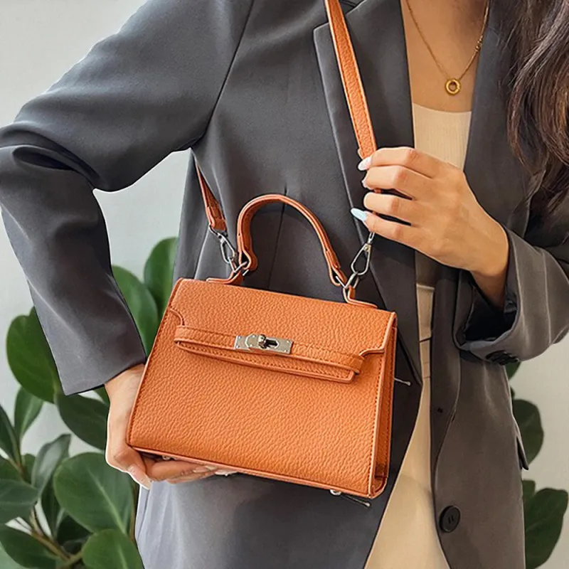 Fleur Mini Tote Bag With Adjustable Crossbody Strap in Orange sold by XYlondon