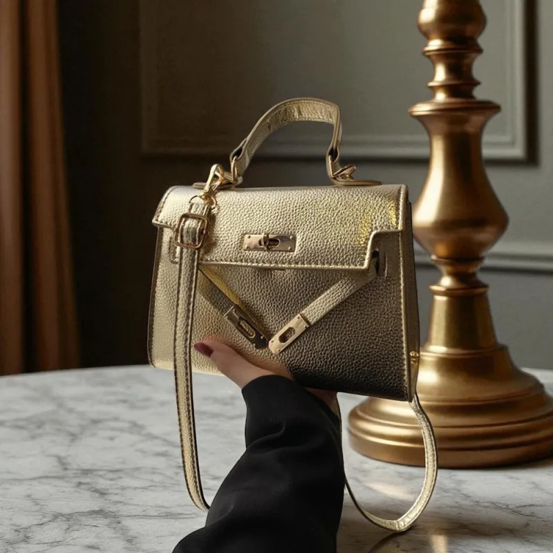 Maeva Structured Top Handle Small Crossbody Tote Bag in Gold sold by XYlondon