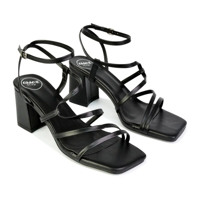 Jesy Ankle Strappy Cross Over Square Toe Mid-Block High Heel Sandals in Black sold by XYlondon