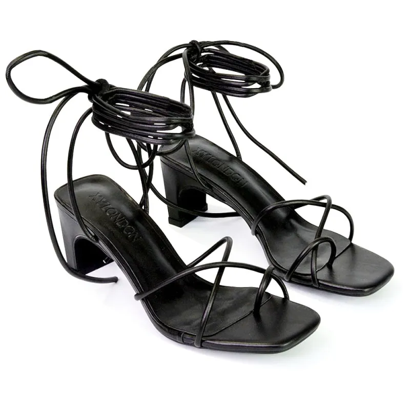 Atlas Lace Up Strappy Thin Mid Block Heel Square Toe Sandals in Black sold by XYlondon