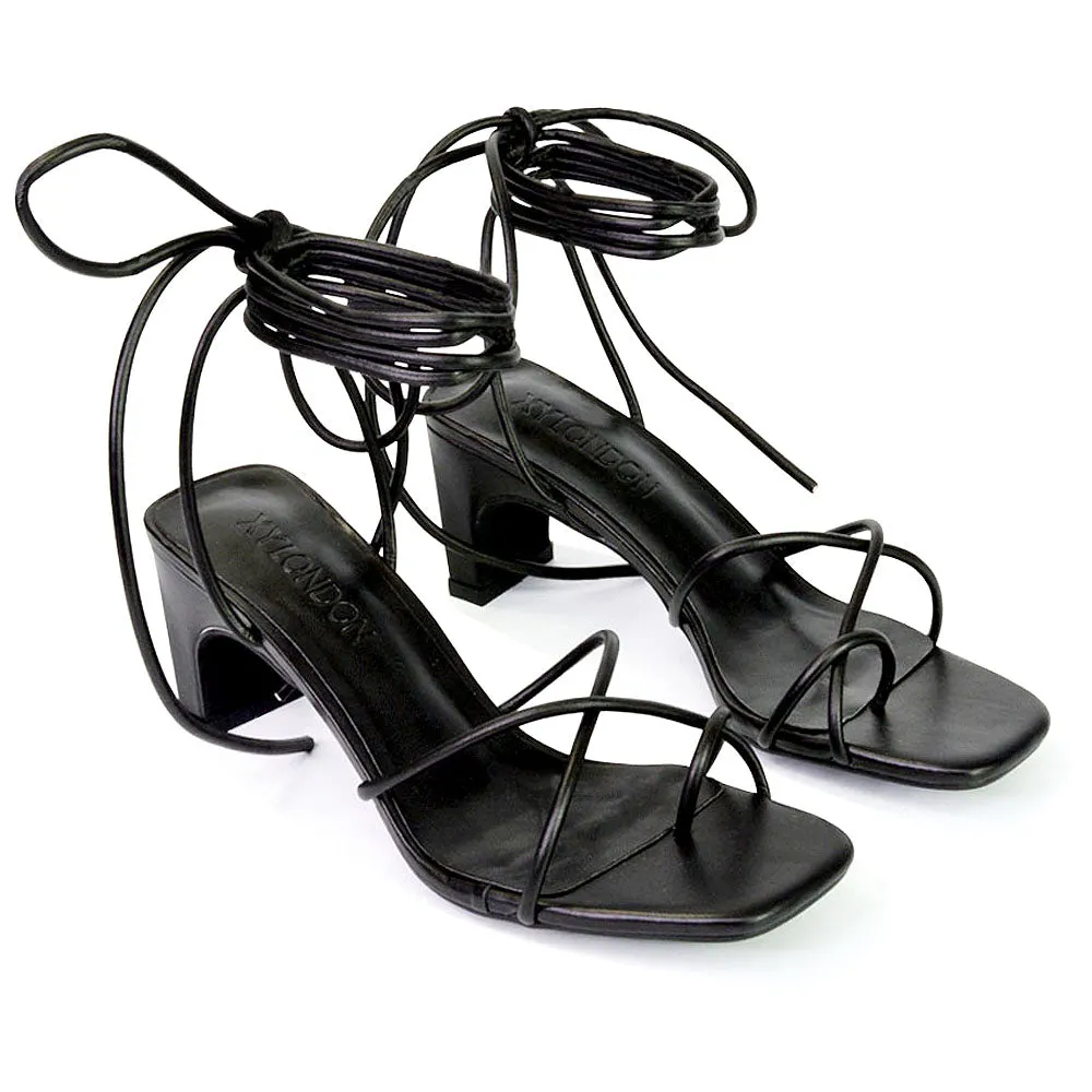 Atlas Lace Up Strappy Thin Mid Block Heel Square Toe Sandals in Black sold by XYlondon
