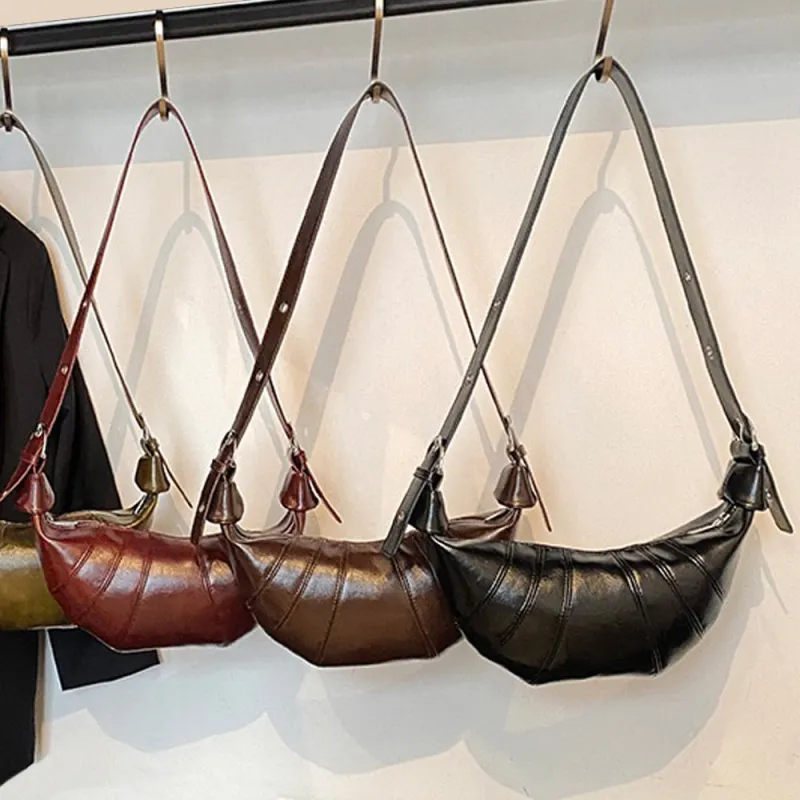 Terry Crossbody Buckle Detail Shoulder Strap Crescent Handbag With Zip in Black sold by XYlondon