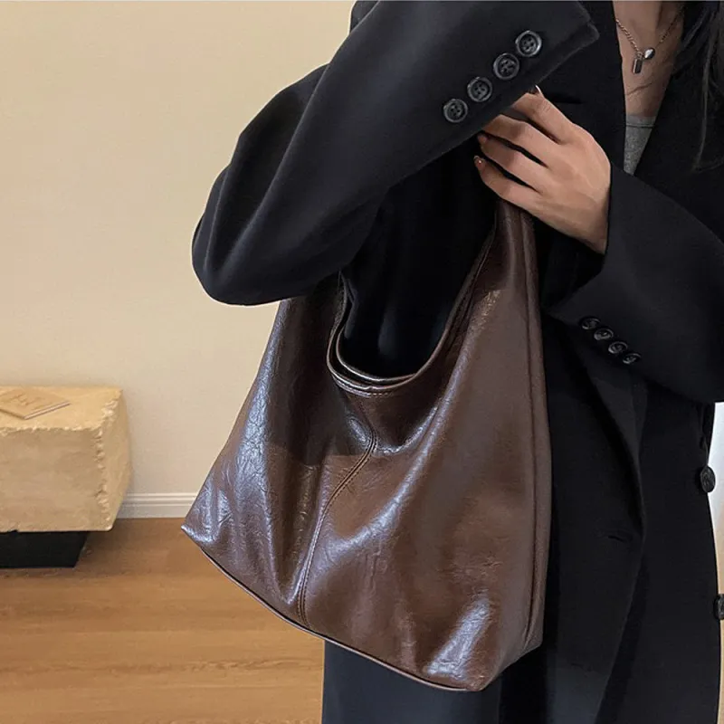 Athena Large Slouchy Shoulder Bag With Magnetic Clasp in Brown sold by XYlondon