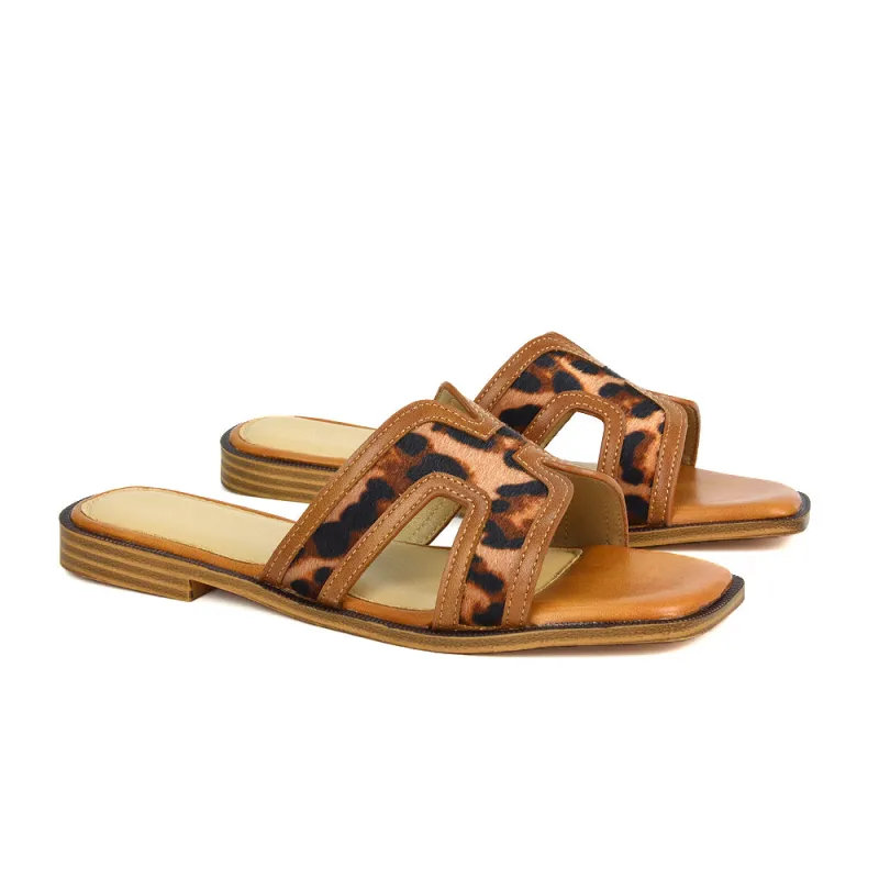 Lola Cut Out Strap Flat Summer Slip On Holiday Slides in Leopard sold by XYlondon