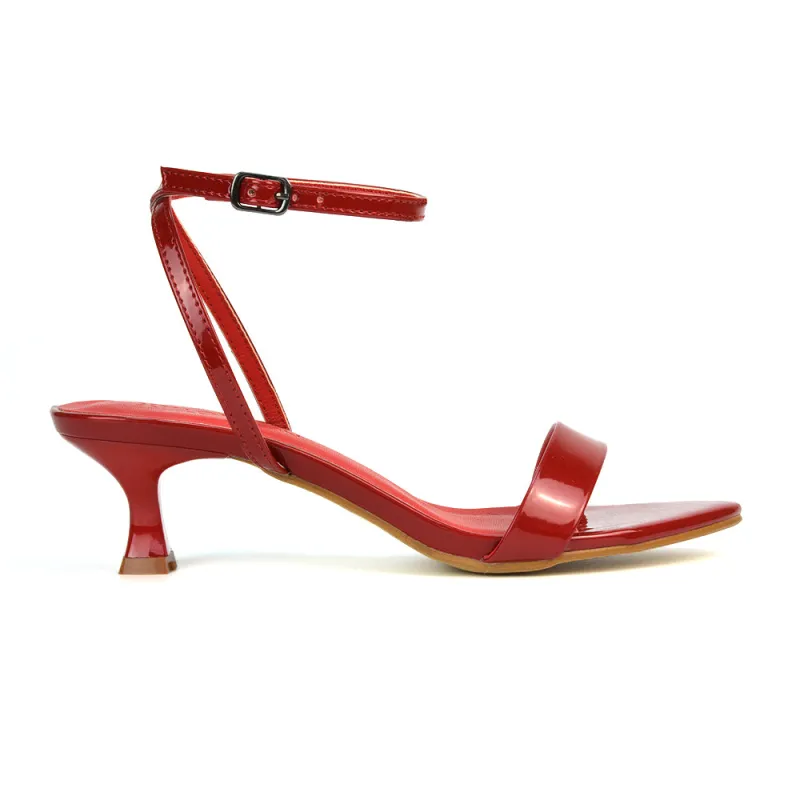 Antonia Strappy Party Kitten Low Heel Sandals in Red Patent sold by XYlondon