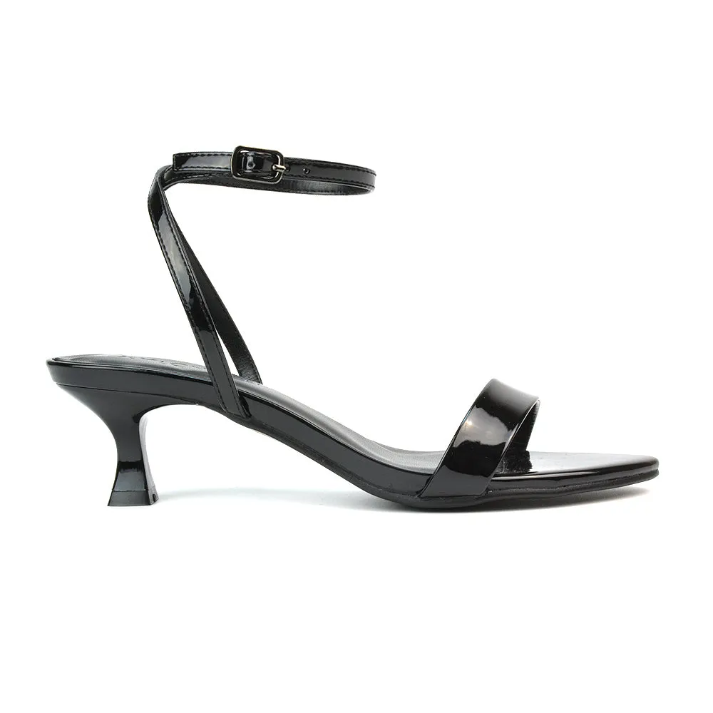 Antonia Strappy Party Kitten Low Heel Sandals in Black Patent sold by XYlondon