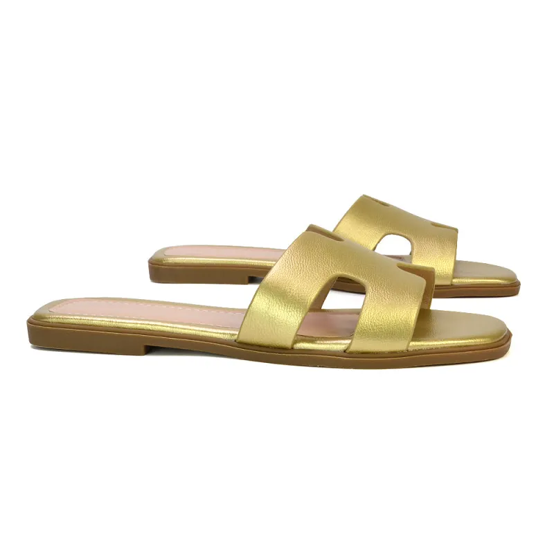 Leanna Cut Out Slip On Flat Sandals Sliders in Gold sold by XYlondon