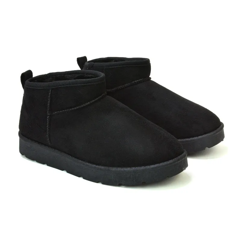 Angelina Flat Ankle Winter Ultra Mini Boots with Faux Fur Insole In Black sold by XYlondon