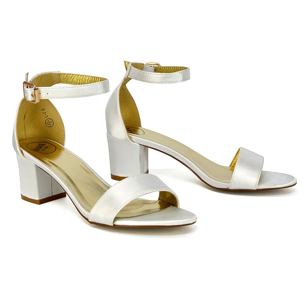 RITA BUCKLE UP ANKLE STRAP LOW MID-BLOCK HIGH HEEL SANDALS IN IVORY SATIN sold by XYlondon