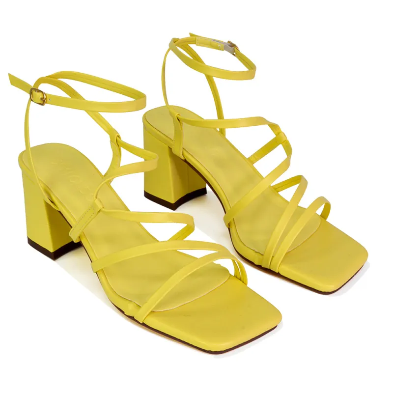 Jesy Ankle Strappy Cross Over Square Toe Mid-Block High Heel Sandals in Yellow sold by XYlondon