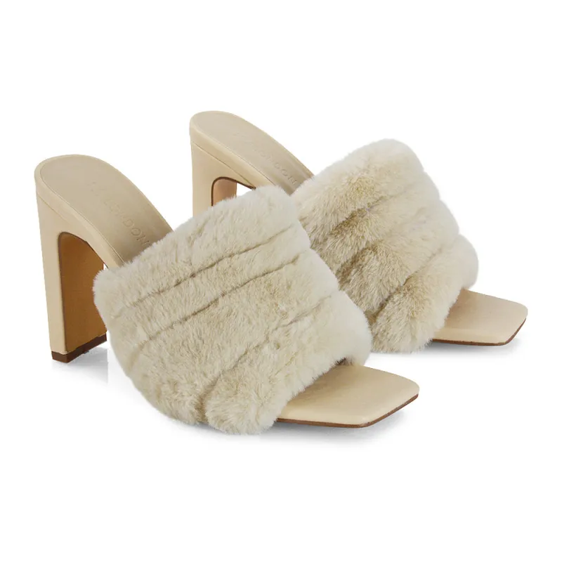Hunter Fluffy Faux Fur Front Strap Square Toe High Slim Block Heel Mules in Nude sold by XYlondon