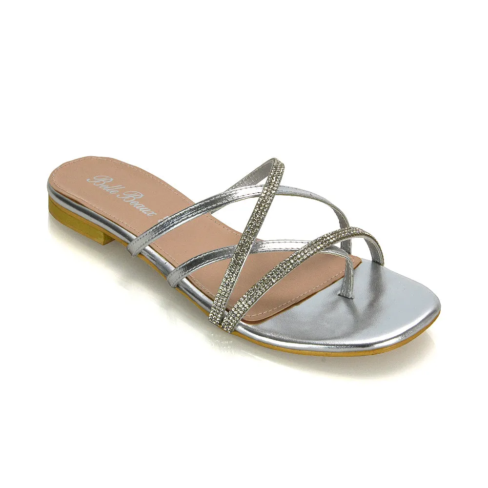 LORETTA CROSS OVER STRAPPY SLIP ON FLAT DIAMANTE SANDALS IN SILVER METALLIC sold by XYlondon