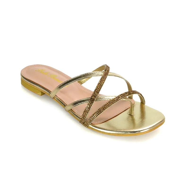 LORETTA CROSS OVER STRAPPY SLIP ON FLAT DIAMANTE SANDALS IN GOLD METALLIC sold by XYlondon