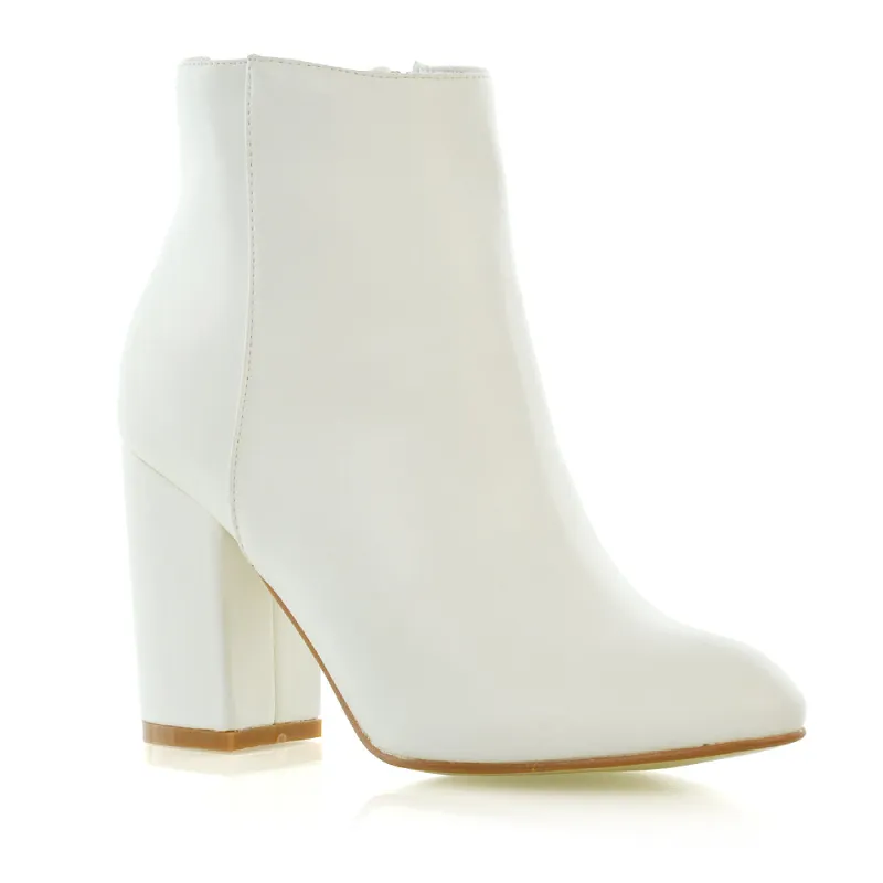 PEACHES CHUNKY BLOCK HIGH HEEL ZIP UP ANKLE WINTER BOOTS IN WHITE SYNTHETIC LEATHER made by XYlondon
