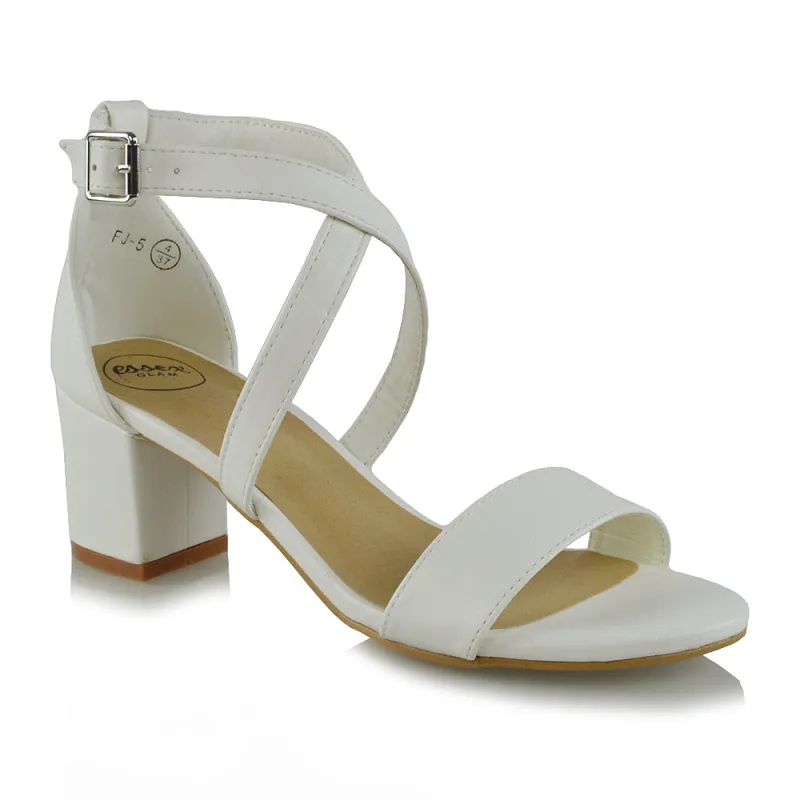 JORDYN CROSS OVER BUCKLE STRAP CHUNKY LOW BLOCK HEELS IN WHITE PU sold by XYlondon
