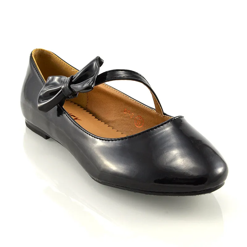 COLETTE FLAT LOW HEEL STRAPPY WITH BOW DETAILING BALLERINA PUMP SHOES IN BLACK PATENT sold by XYlondon