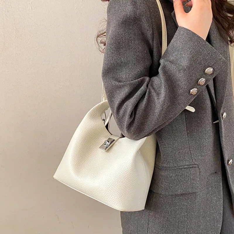 Storm Small Crossbody Bag With Detachable Bag Charm in White made by XYlondon