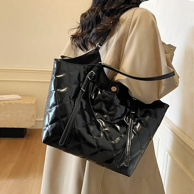 Magnolia Women's Quilted Wet look Tote Bag with Handle in Black made by XYlondon