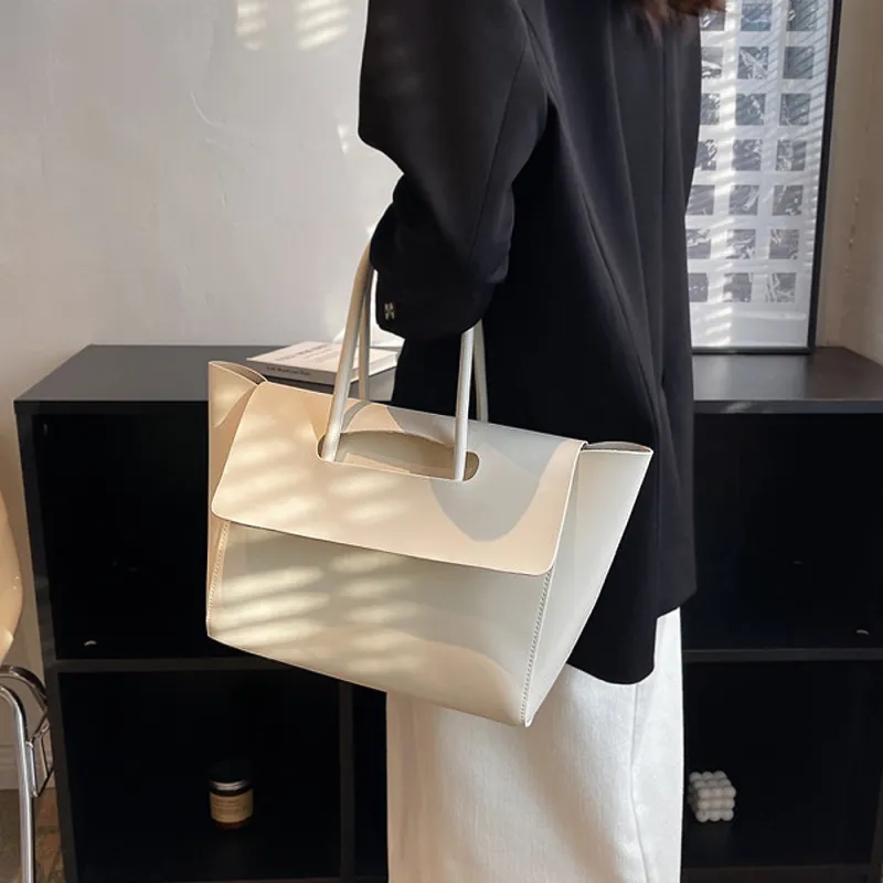 Indie Faux Leather Flap over Handle Shoulder Tote Bag in Beige sold by XYlondon