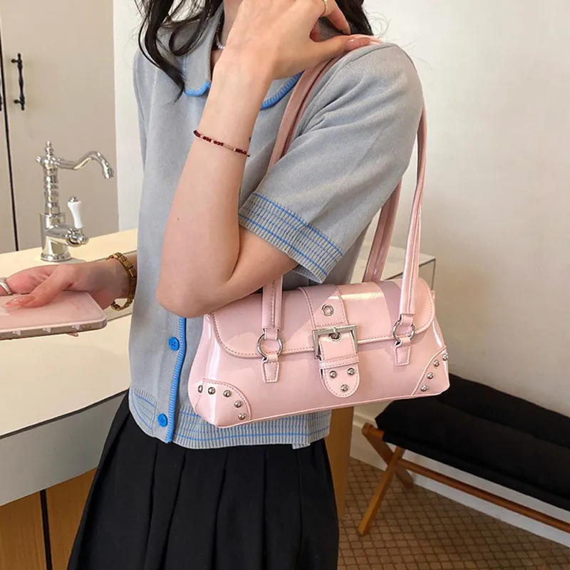 Caria Studded Faux Leather Structured Shoulder Bag With Belt in Pink made by XYlondon
