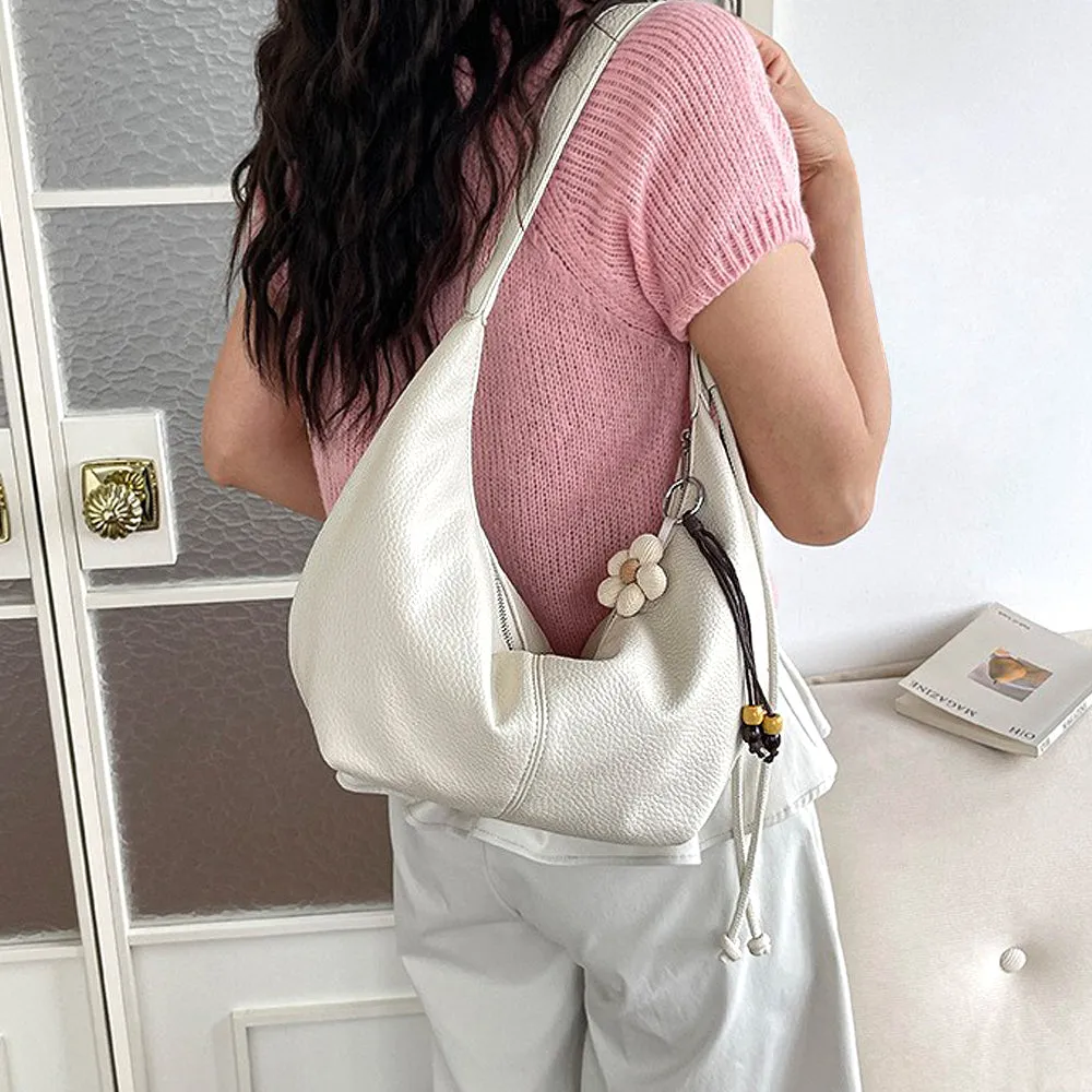 Calla Faux Leather Crescent Shoulder Handbag With Crossbody Strap in White sold by XYlondon