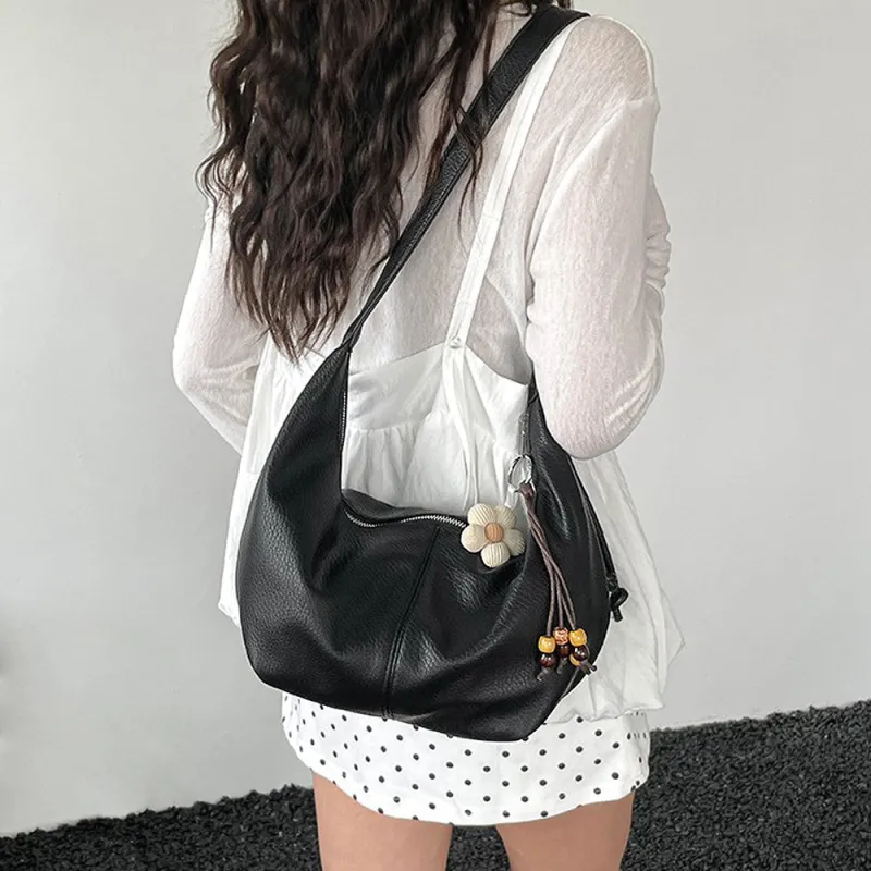 Calla Faux Leather Crescent Shoulder Handbag With Crossbody Strap in Black made by XYlondon