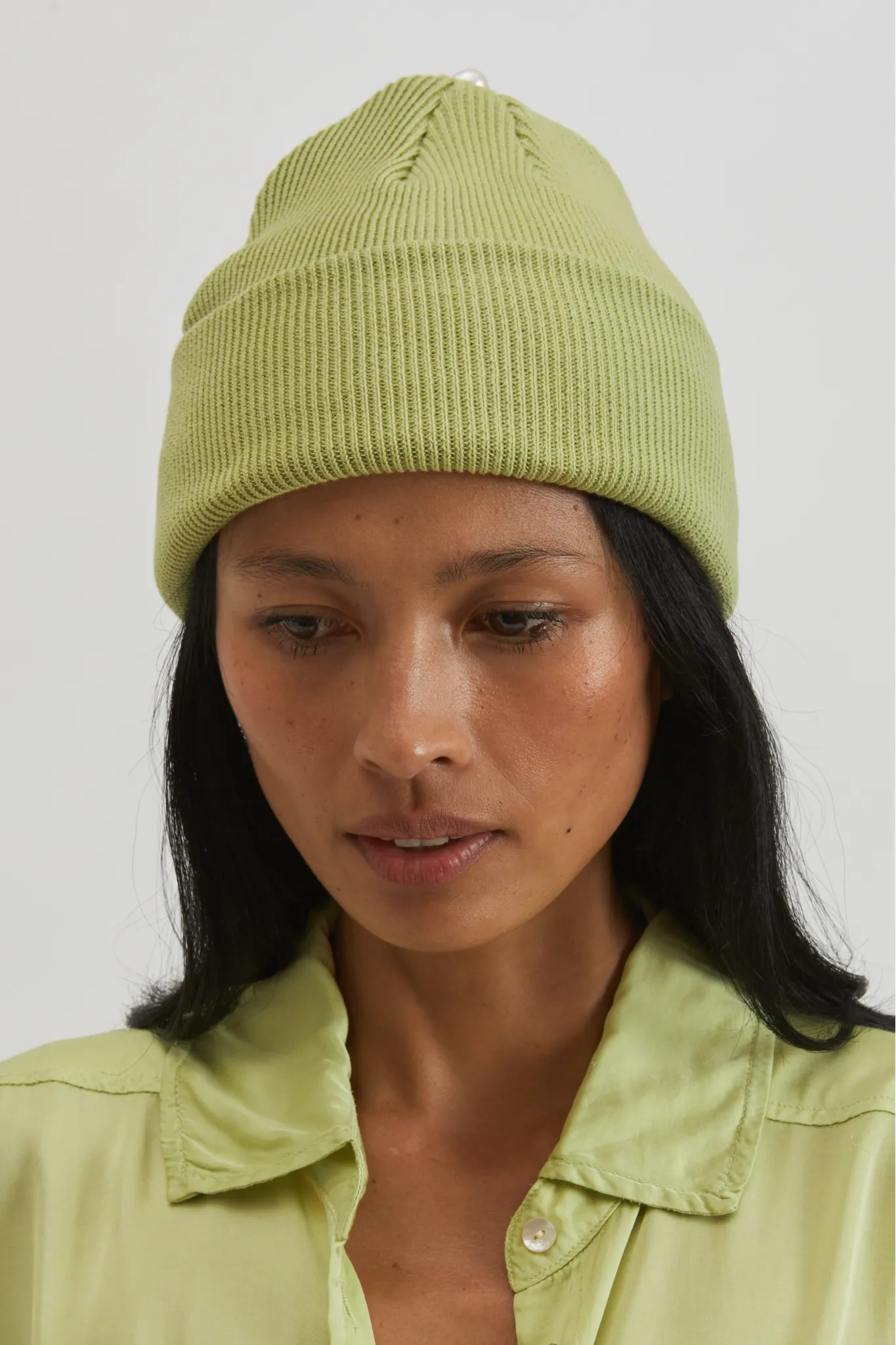 pearl beanie sold by DONNI.