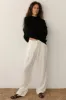 The Pleated Trouser sold by DONNI.