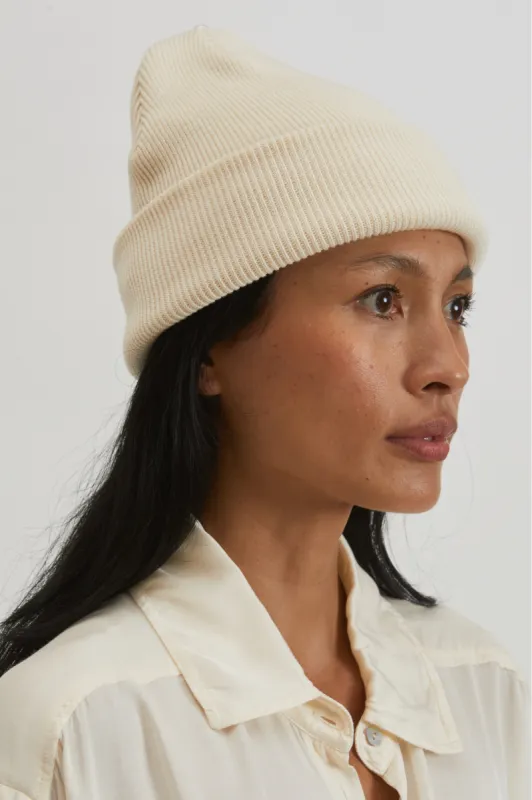 pearl beanie sold by DONNI.